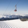 Modern lifts take you to perfectly groomed slopes.