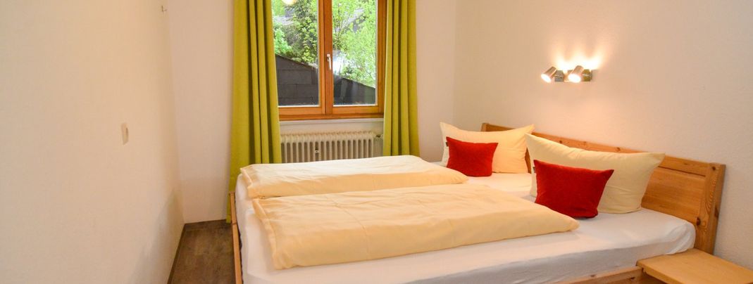 Schlafzimmer mit Doppelbett