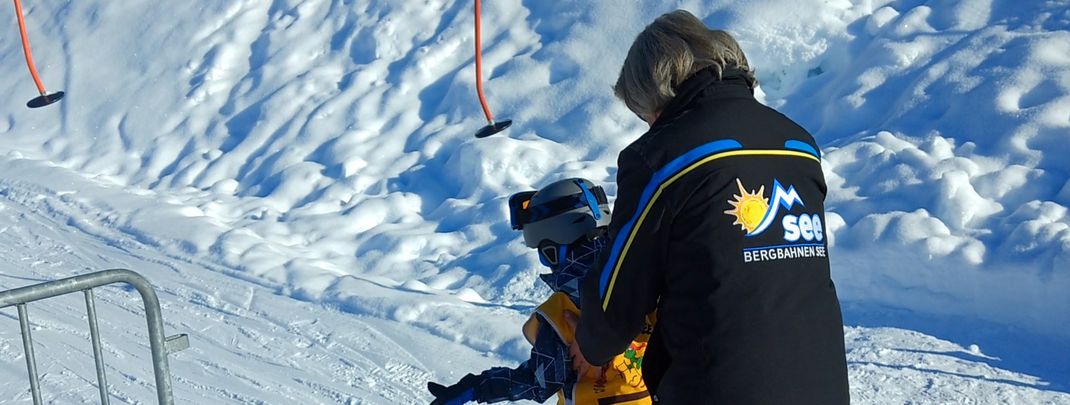 An employee will help you get on the platter lift.