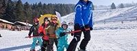 © http://www.atzmaennig.chSchneesport Unterricht mit Frechspatz Männi