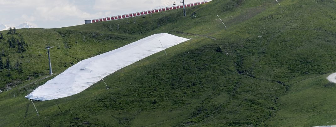 During the summer, the snow of the last winter season is waiting for its re-use in fall.