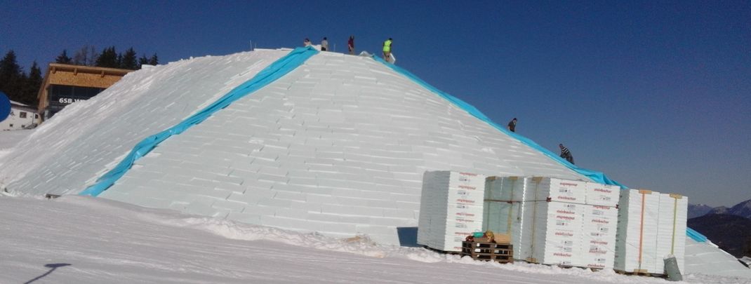 The snow depot is insulated with hard foam boards.