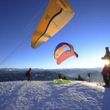 Mit der Seilbahn bringen die Bergbahnen Werfenweng Paragleiter direkt zum Startplatz