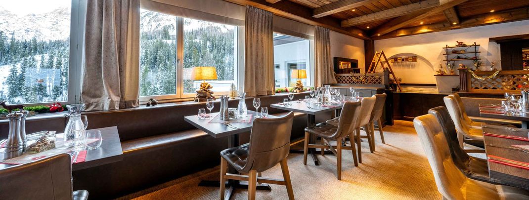 Der Arosa Alpine Club bietet Komfort und Abenteuer in den Schweizer Alpen.