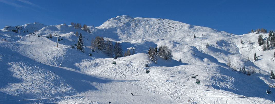 Urlaubsglück im Schnee im Hotel Chalets Grosslehen