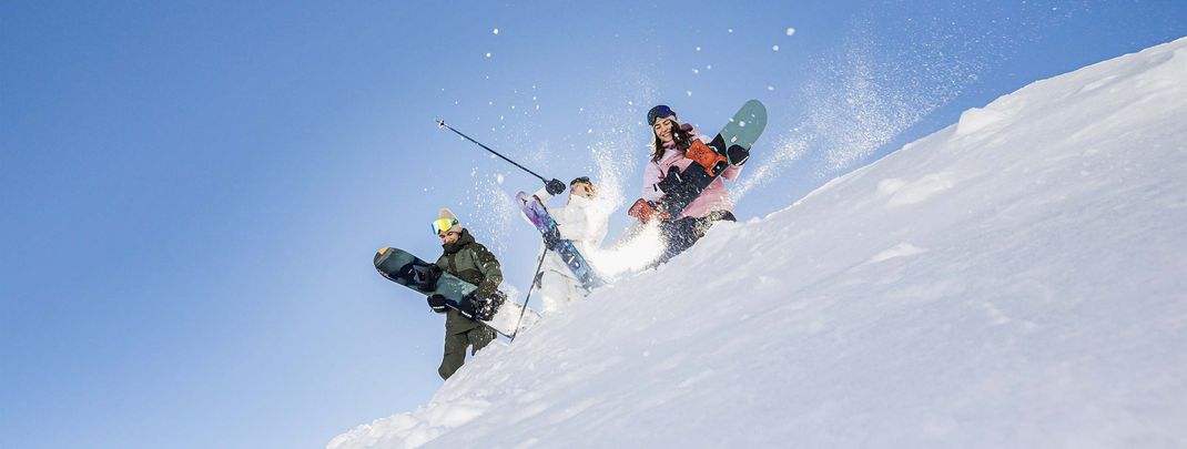Pistenspaß bei spektakulärer Aussicht - das erwartet dich in den Skigebieten im SalzburgerLand.