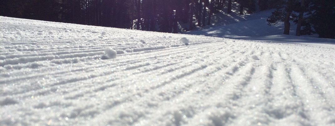 Artificial snow is used at the base so the runs are also perfectly groomed.