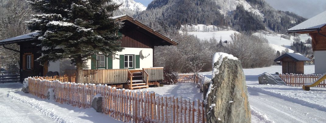 Ansicht Winter Ferienhaus - Blockhaus Abendrot