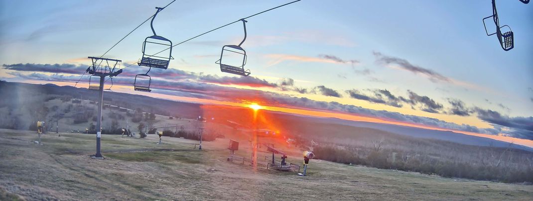 Bare grass instead of snowy slopes: Many Australian ski resorts have ended their season early, including Selwyn, pictured here.