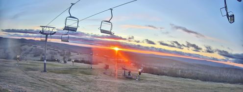 Bare grass instead of snowy slopes: Many Australian ski resorts have ended their season early, including Selwyn, pictured here.