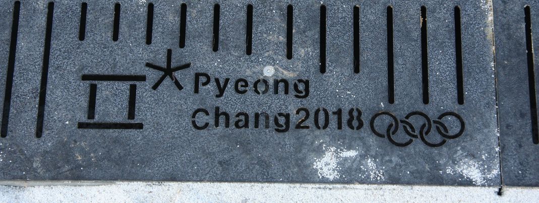 The logo of the Olympic Winter Games 2018 is depicted almost everywhere - even in the pavements around the new arenas.