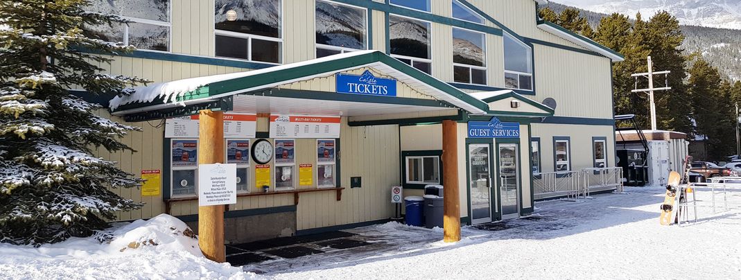 Ticket booth and visitor information by the entry.