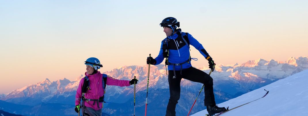 Skitouren führen durch die winterliche Landschaft des Val di Fiemme