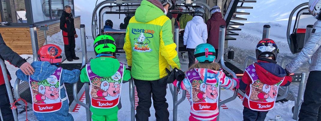 The ski course ventures up to the blue slopes.