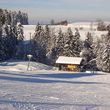 Hungry skiers stop in the Liftestüble at the base station.