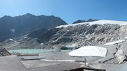 Archiviertes Webcam Bild: Sölden Rettenbachgletscher: Weltcuptribüne und Talstation am 12.07.2026 um 10:15 Uhr