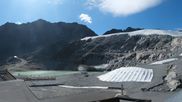 Archiviertes Webcam Bild: Sölden Rettenbachgletscher: Weltcuptribüne und Talstation am 26.08.2026 um 10:57 Uhr