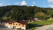 Archiviertes Webcam Bild: Ramsau am Dachstein: Blick ins WM Stadion am 12.07.2026 um 07:20 Uhr