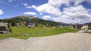 Archived webcam image showing Roundshot Parpan on 15 Jun 2026 at 12:53