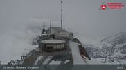 Archiviertes Webcam Bild: Corvatsch: Bergstation am 12.04.2026 um 15:50 Uhr