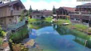 Archived webcam image showing INNs HOLZ, Chalet Village Böhmerwald on 17 Jun 2026 at 12:54
