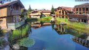 Archived webcam image showing INNs HOLZ, Chalet Village Böhmerwald on 14 Jul 2026 at 08:19