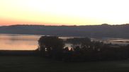 Archived webcam image showing View over the Wallersee on 1 Oct 2026 at 07:36