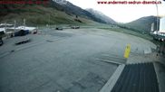 Archived webcam image showing Andermatt – Parking area Gemsstock Ropeway on 1 May 2026 at 06:58