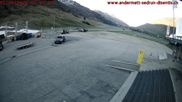 Archived webcam image showing Andermatt – Parking area Gemsstock Ropeway on 1 May 2026 at 07:58