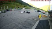 Archived webcam image showing Andermatt – Parking area Gemsstock Ropeway on 14 Jun 2026 at 06:50