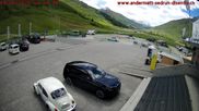 Archived webcam image showing Andermatt – Parking area Gemsstock Ropeway on 14 Jun 2026 at 14:50
