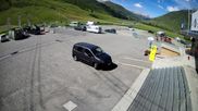 Archived webcam image showing Andermatt – Parking area Gemsstock Ropeway on 14 Jun 2026 at 10:50