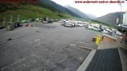 Archived webcam image showing Andermatt – Parking area Gemsstock Ropeway on 13 Aug 2026 at 06:22