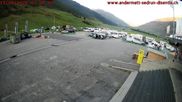 Archived webcam image showing Andermatt – Parking area Gemsstock Ropeway on 13 Aug 2026 at 07:22
