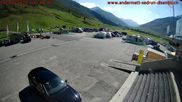 Archived webcam image showing Andermatt – Parking area Gemsstock Ropeway on 13 Aug 2026 at 16:22