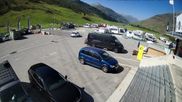 Archived webcam image showing Andermatt – Parking area Gemsstock Ropeway on 13 Aug 2026 at 10:22