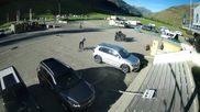 Archiviertes Webcam Bild: Andermatt: Parkplatz Gemsstockbahn am 26.08.2026 um 08:24 Uhr
