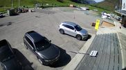Archiviertes Webcam Bild: Andermatt: Parkplatz Gemsstockbahn am 26.08.2026 um 10:24 Uhr