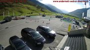Archived webcam image showing Andermatt – Parking area Gemsstock Ropeway on 21 Sep 2026 at 16:15