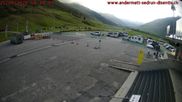 Archived webcam image showing Andermatt – Parking area Gemsstock Ropeway on 21 Sep 2026 at 18:15