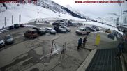 Archived webcam image showing Andermatt – Parking area Gemsstock Ropeway on 16 Mar 2026 at 14:32