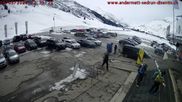 Archived webcam image showing Andermatt – Parking area Gemsstock Ropeway on 16 Mar 2026 at 12:32