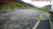Archiviertes Webcam Bild: Andermatt: Parkplatz Gemsstockbahn am 10.10.2026 um 12:45 Uhr