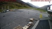 Archived webcam image showing Andermatt – Parking area Gemsstock Ropeway on 12 Oct 2026 at 18:02