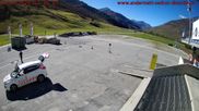 Archived webcam image showing Andermatt – Parking area Gemsstock Ropeway on 12 Oct 2026 at 12:02