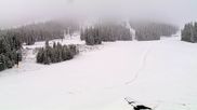 Archived webcam image showing Winter Park Eskimo Chairlift and Snoasis Restaurant on 27 Apr 2026 at 16:34
