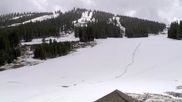 Archived webcam image showing Winter Park Eskimo Chairlift and Snoasis Restaurant on 27 Apr 2026 at 22:34