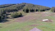 Archived webcam image showing Winter Park Eskimo Chairlift and Snoasis Restaurant on 11 Jun 2026 at 16:34