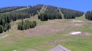 Archived webcam image showing Winter Park Eskimo Chairlift and Snoasis Restaurant on 11 Jun 2026 at 20:34