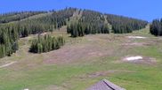 Archived webcam image showing Winter Park Eskimo Chairlift and Snoasis Restaurant on 11 Jun 2026 at 22:34